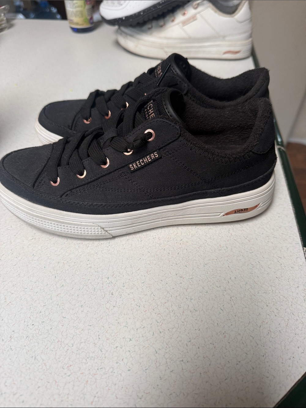 Skechers Women’s Black Casual Sneakers with Rose Gold Accents